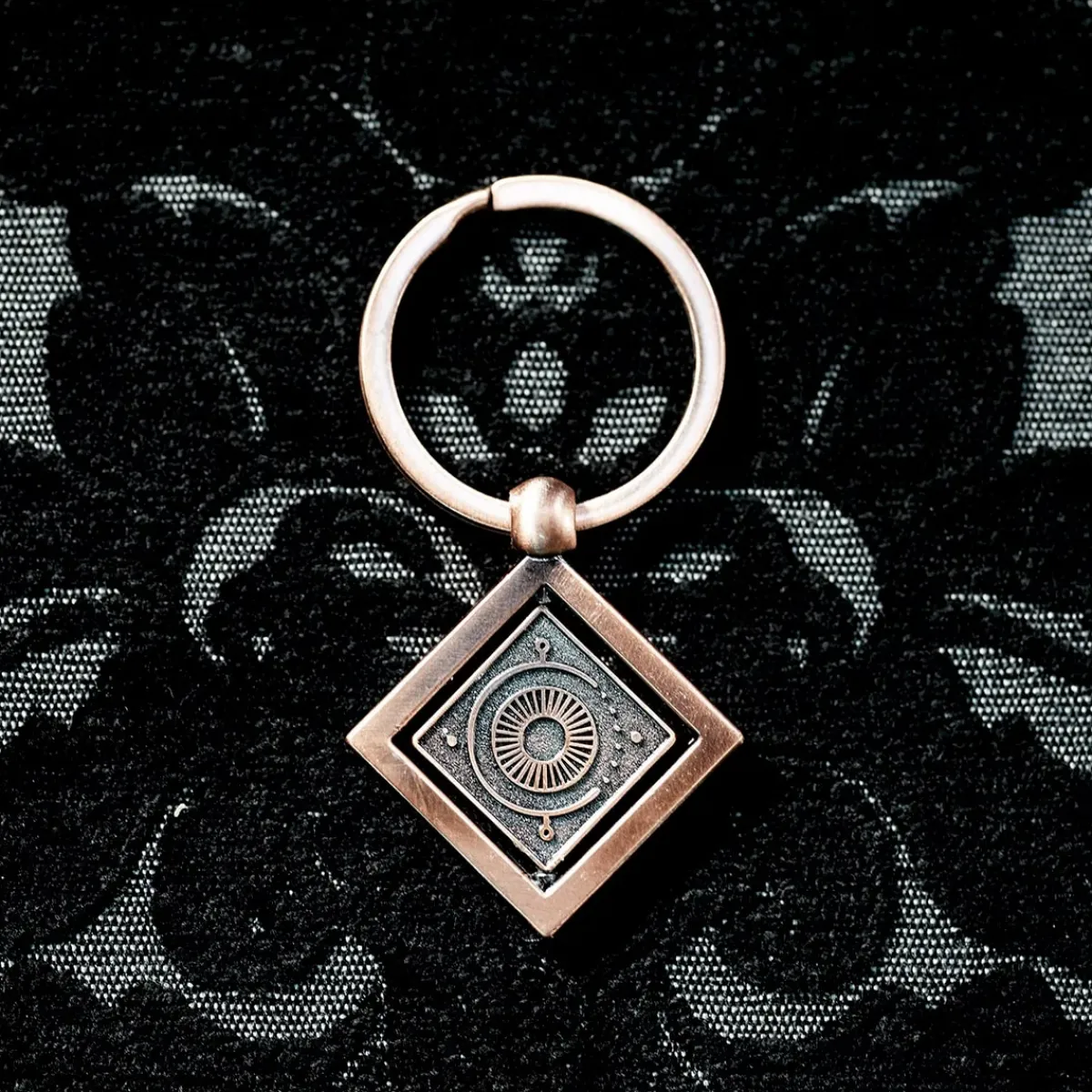 Critical Role Key Chains>Candela Obscura Spinning Keychain